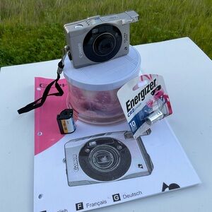 “Pre-Owned” Canon ELPH 370Z APS Camera.  Film Inc-Silver.  New Batteries.